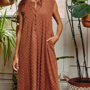 sleeveless brown jumpsuit